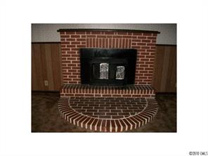 2537 Hillian-Edwards Road Cheraw, SC 29520 - Photo 9 of 13 a black and white photo of a fireplace