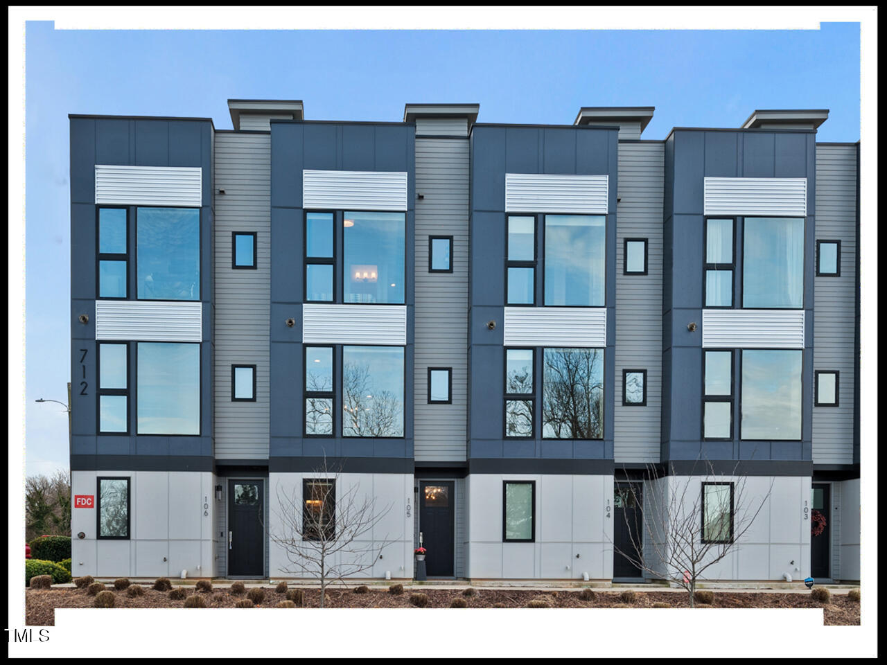 712 East Edenton Street, Unit 105 Raleigh, NC 27601 - Photo 1 of 48 a black and white photo of a building