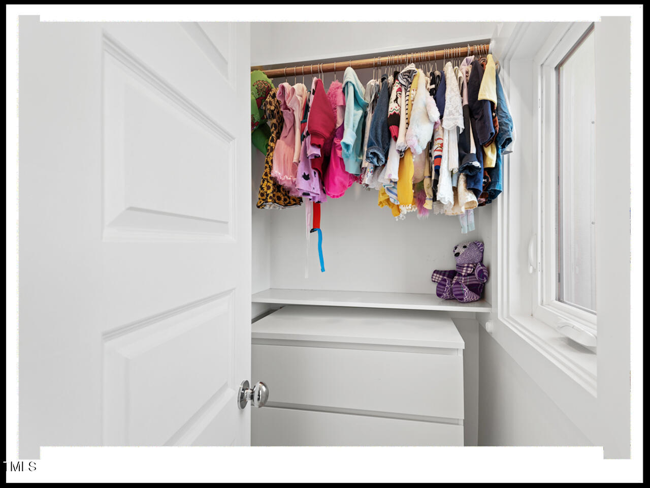712 East Edenton Street, Unit 105 Raleigh, NC 27601 - Photo 34 of 48 a utility room with a refrigerator and a white cabinet