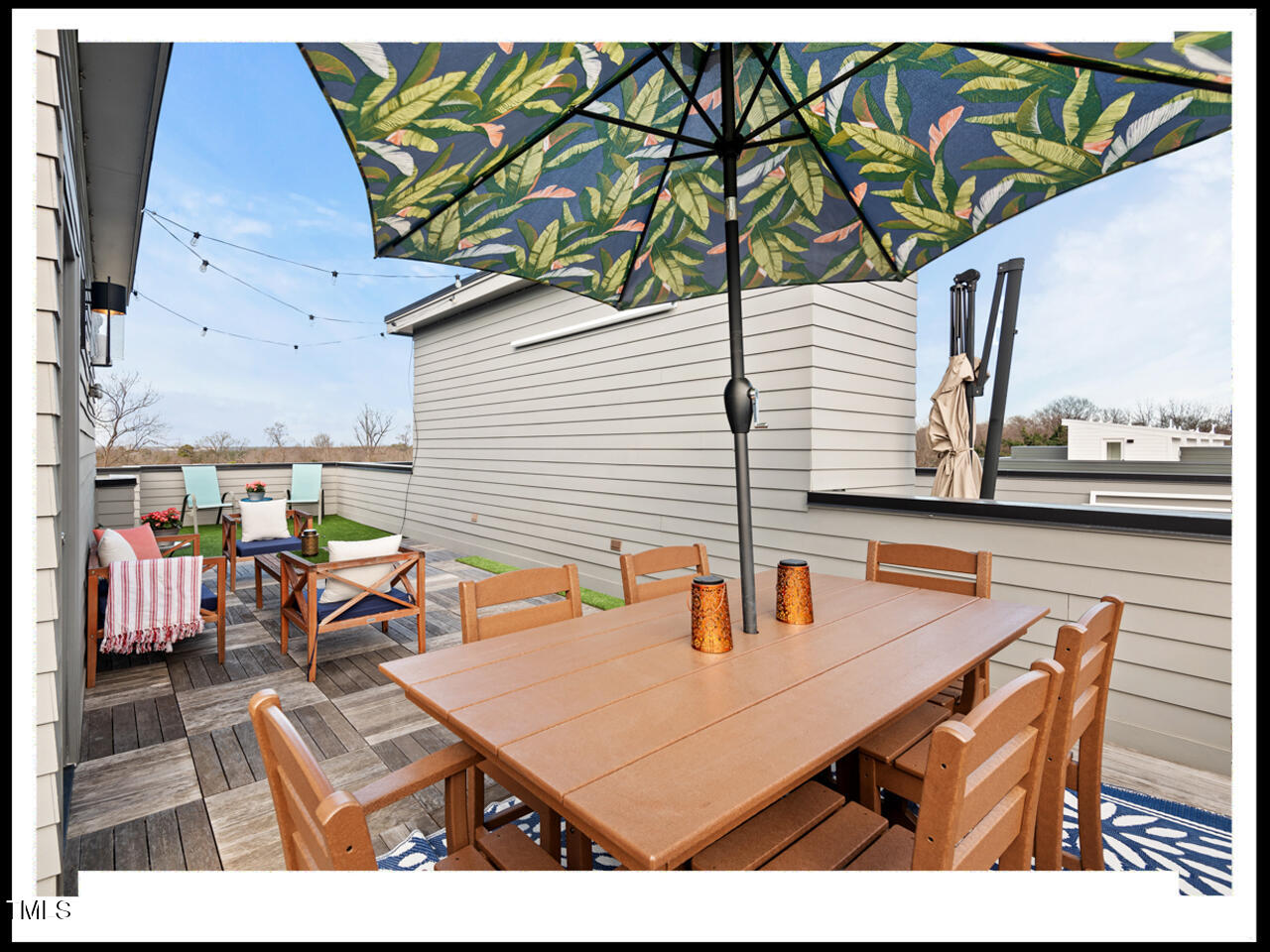 712 East Edenton Street, Unit 105 Raleigh, NC 27601 - Photo 37 of 48 a outdoor dining space with furniture