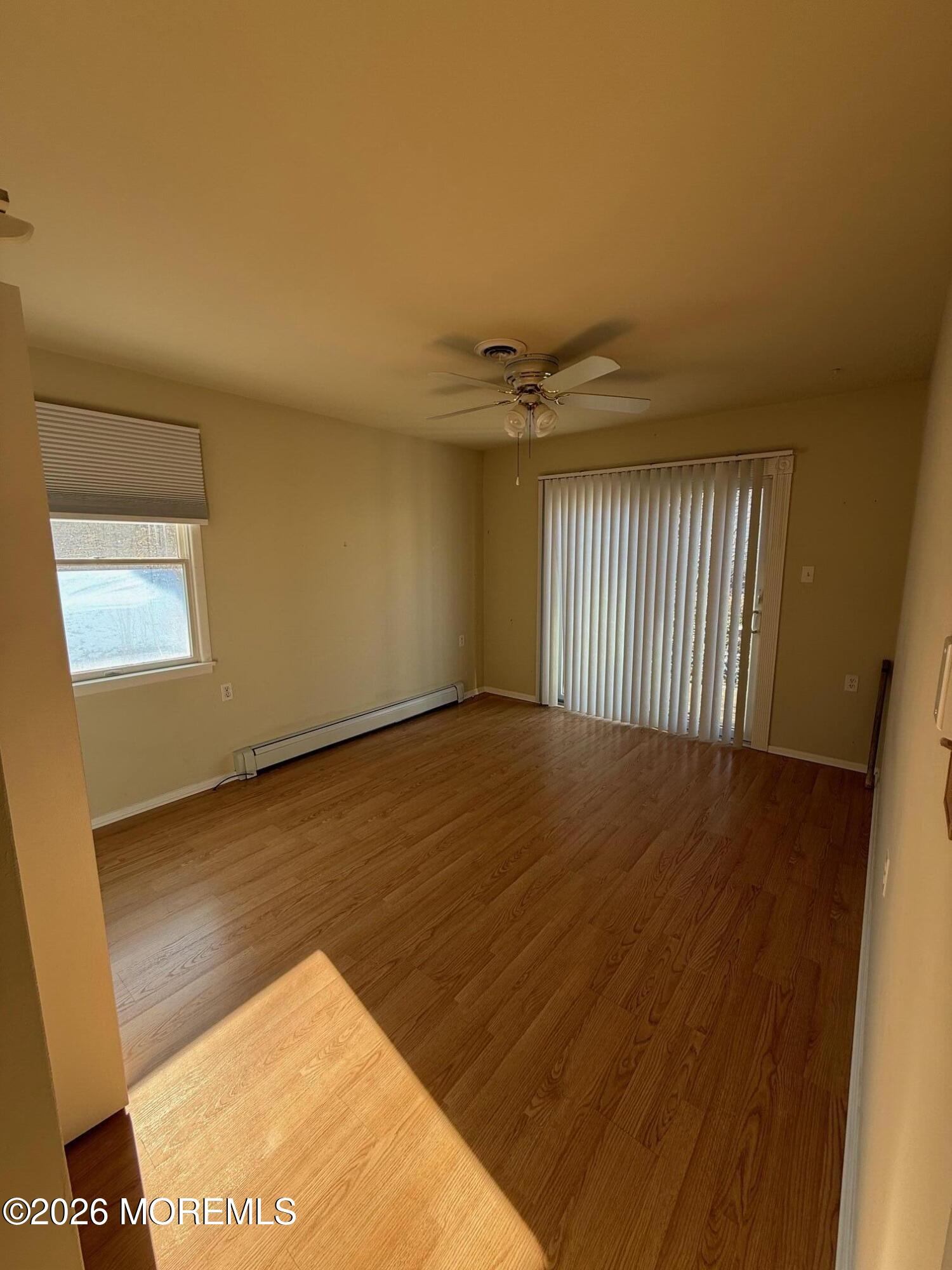 18 Magnolia Road Manahawkin, NJ 08050 - Photo 6 of 10 a view of an empty room and window