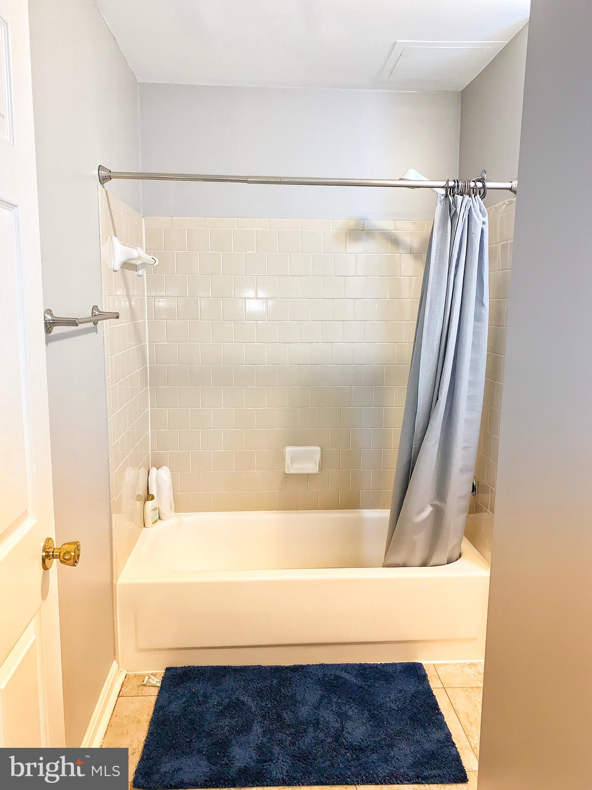 21029 Timber Ridge Terrace, Unit 102 Ashburn, VA 20147 - Photo 16 of 39 Full bathroom entrance from the Hallway