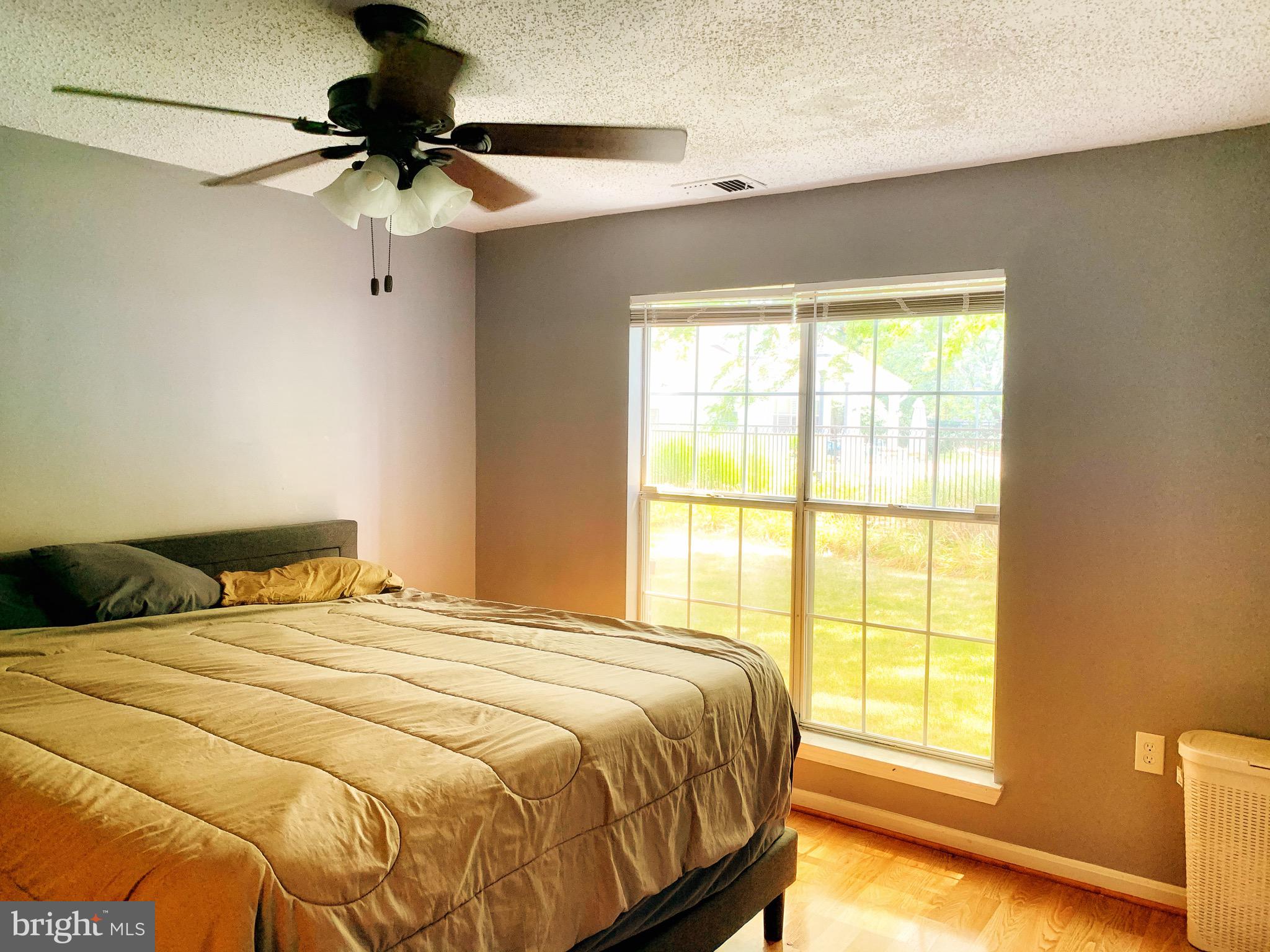 21029 Timber Ridge Terrace, Unit 102 Ashburn, VA 20147 - Photo 20 of 39 Master bedroom plenty of sunlight