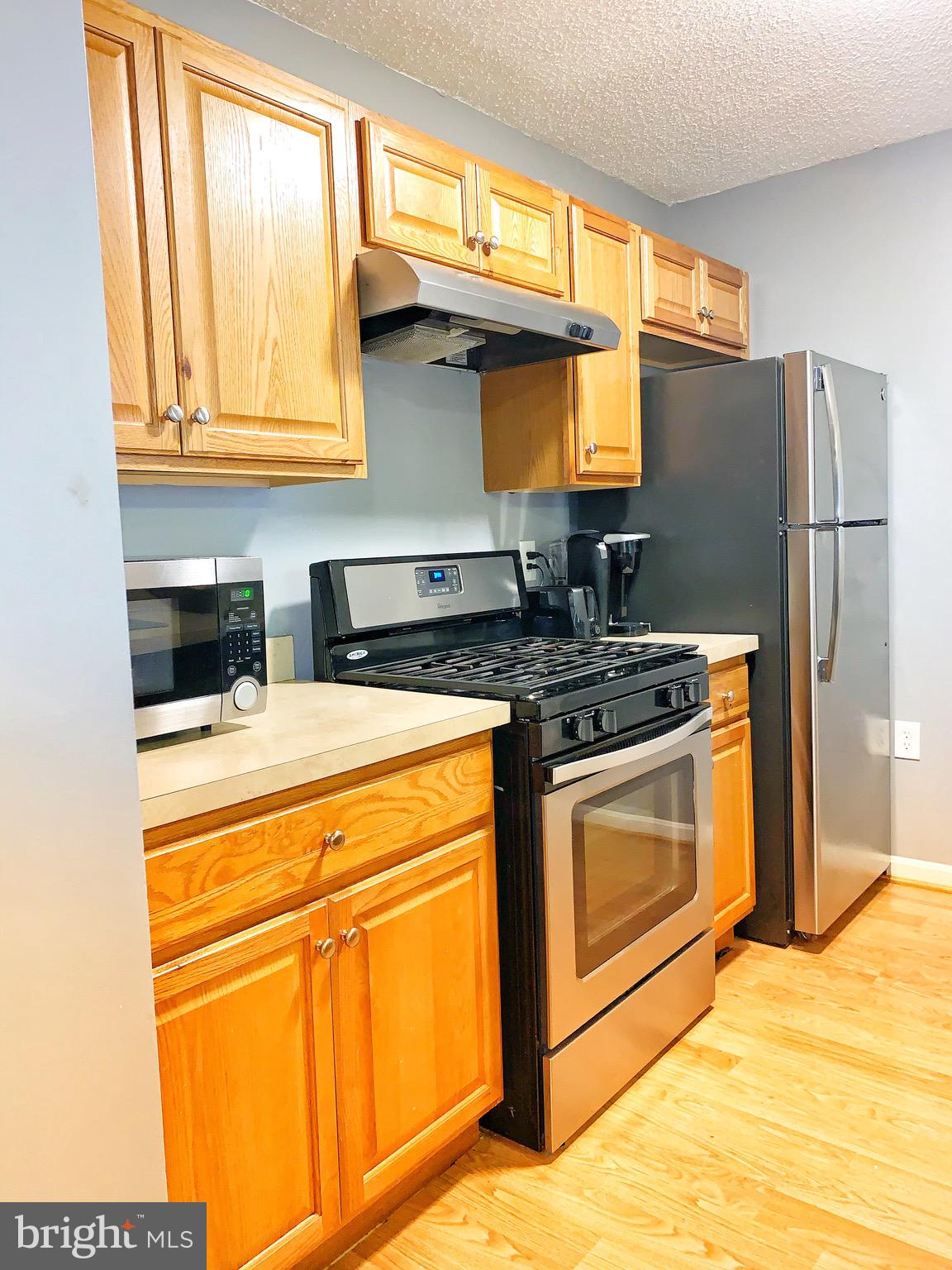 21029 Timber Ridge Terrace, Unit 102 Ashburn, VA 20147 - Photo 8 of 39 Stainless steel appliances
