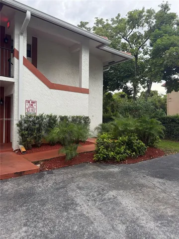 a view of backyard with outdoor space