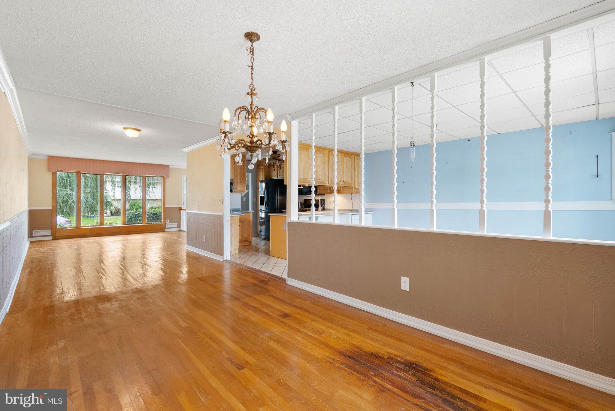 711 George Lane Glendora, NJ 08029 - Photo 13 of 43 a view of a livingroom with a chandelier