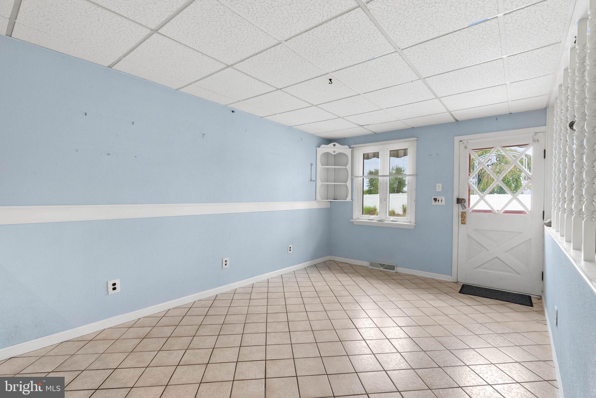 711 George Lane Glendora, NJ 08029 - Photo 14 of 43 a view of an empty room with window and cabinet