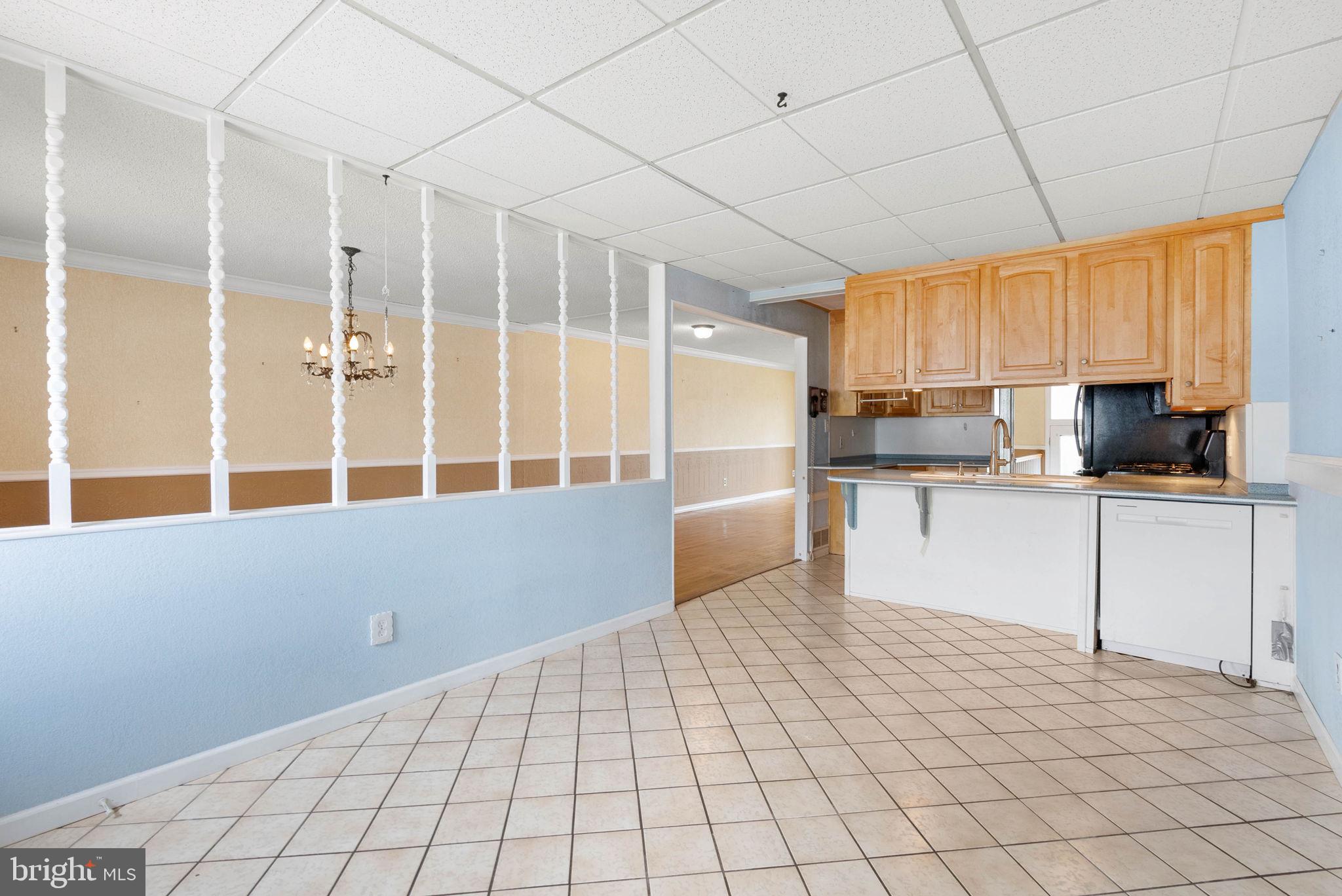711 George Lane Glendora, NJ 08029 - Photo 15 of 43 a kitchen with stainless steel appliances a cabinets and a refrigerator