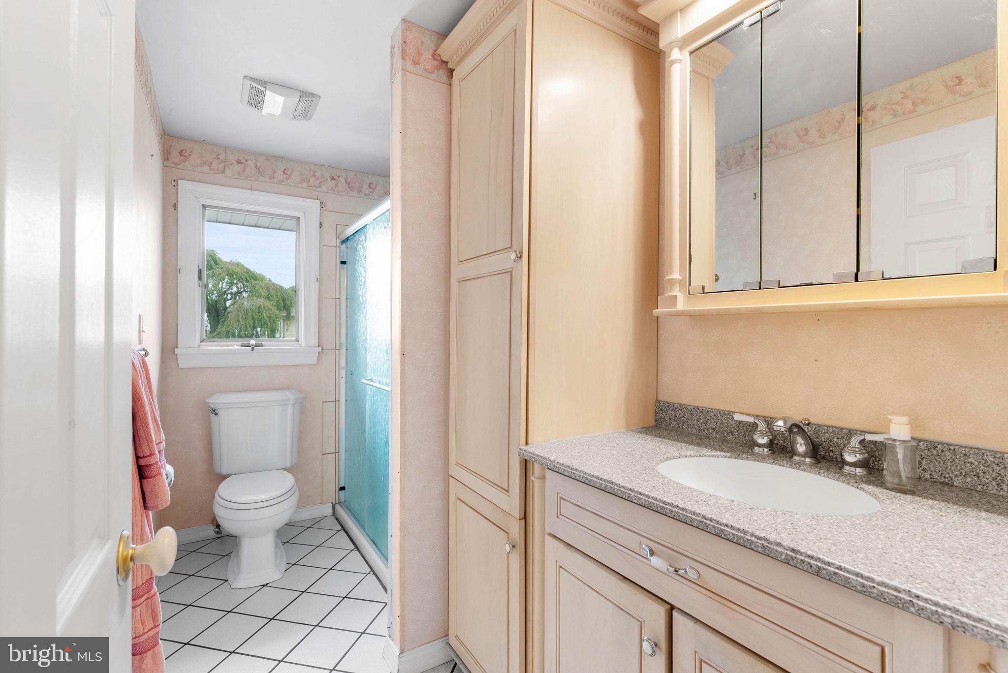 711 George Lane Glendora, NJ 08029 - Photo 26 of 43 a bathroom with a sink a toilet and a shower