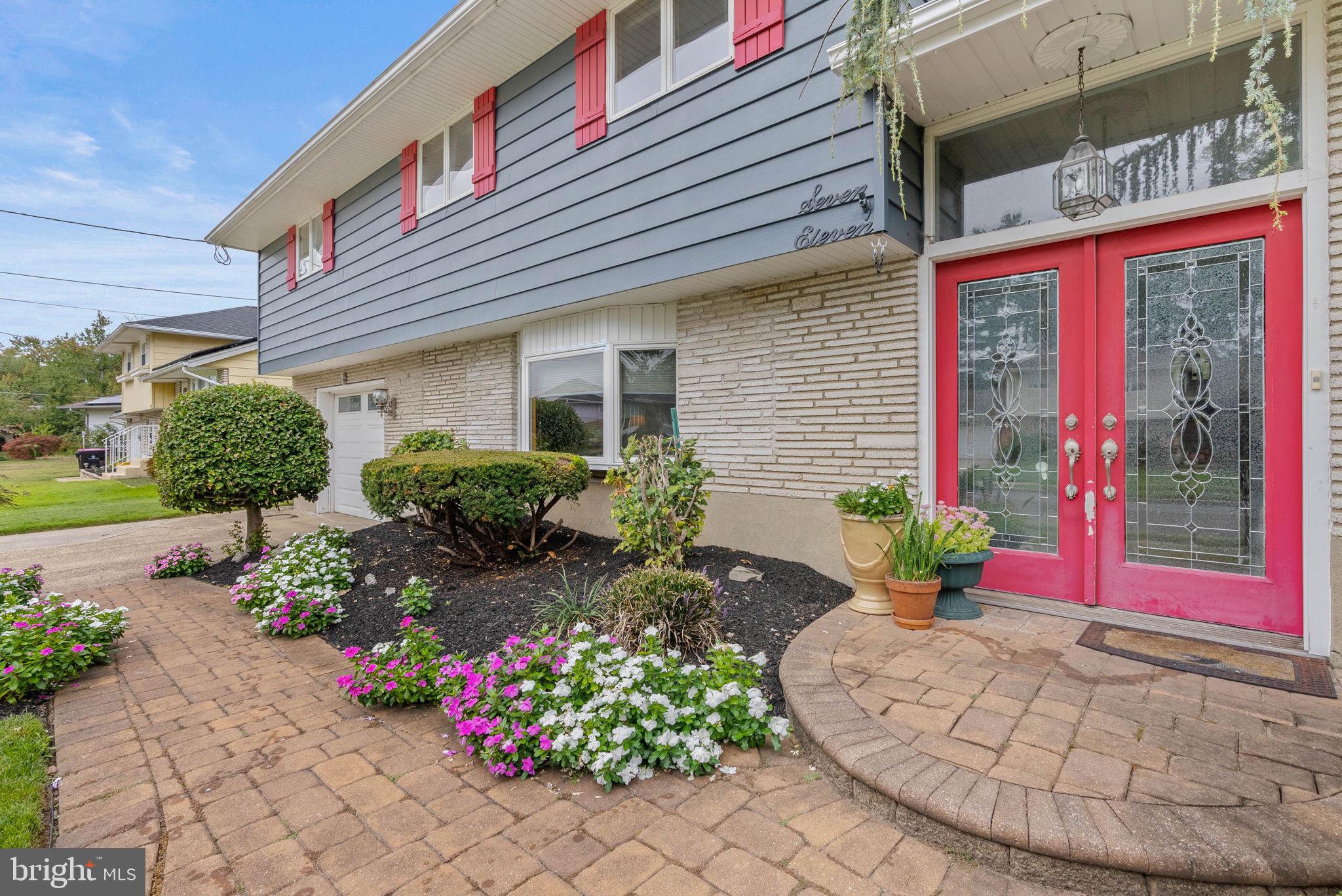 711 George Lane Glendora, NJ 08029 - Photo 5 of 43 a view of a house with potted plants