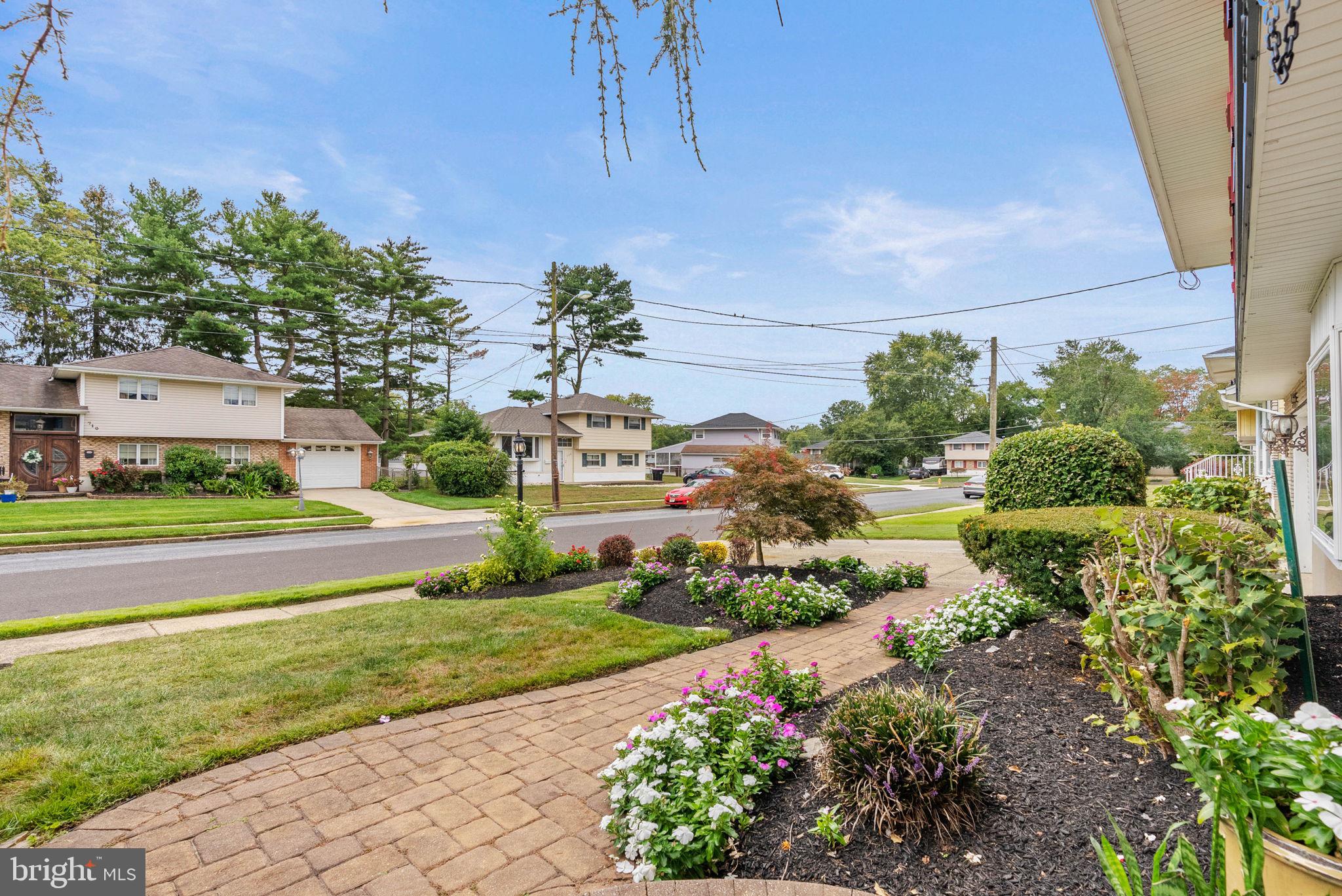 711 George Lane Glendora, NJ 08029 - Photo 6 of 43 a view of building with garden