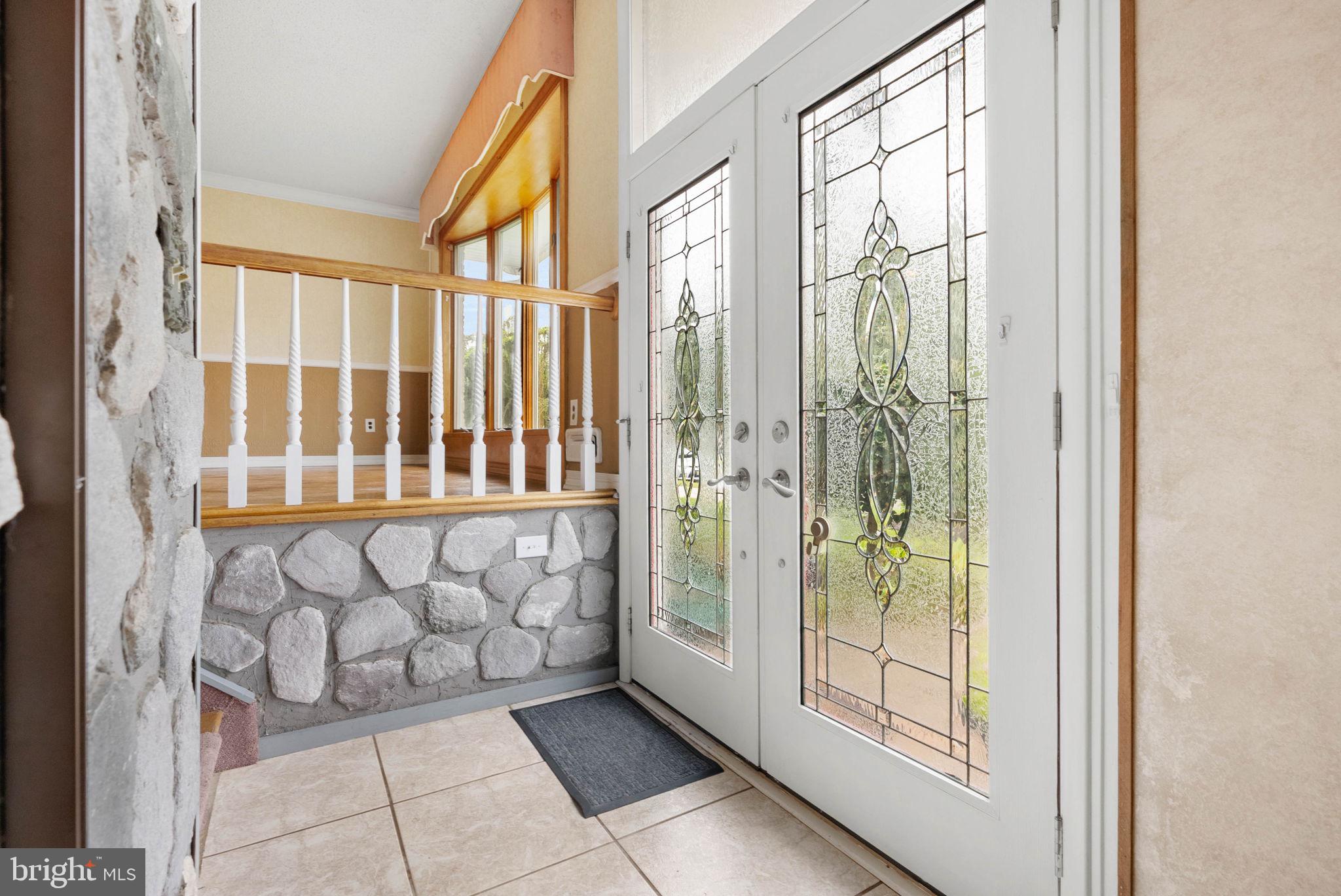 711 George Lane Glendora, NJ 08029 - Photo 7 of 43 a view of an entryway with wooden floor