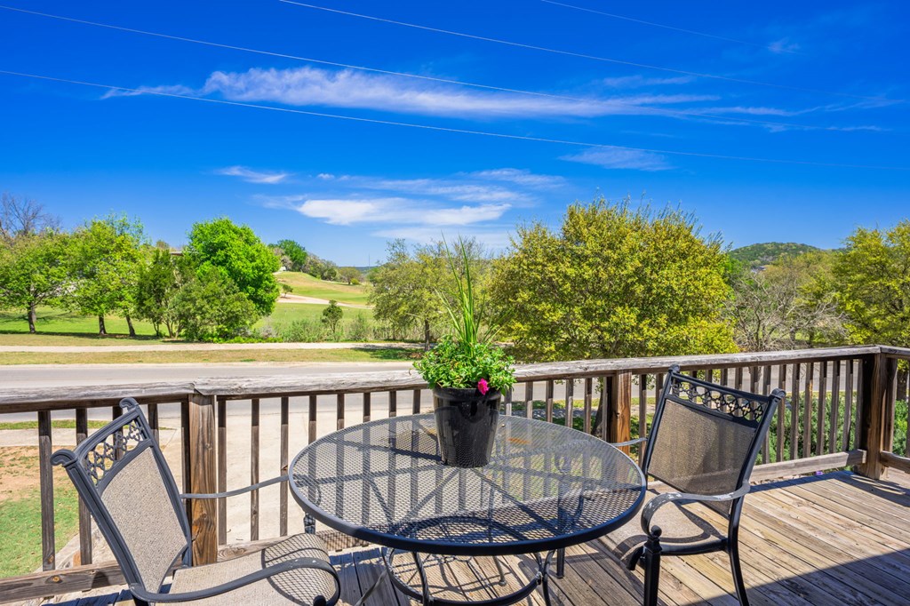 825 Golf Street Kerrville, TX 78028 - Photo 16 of 38 a view of a balcony with furniture
