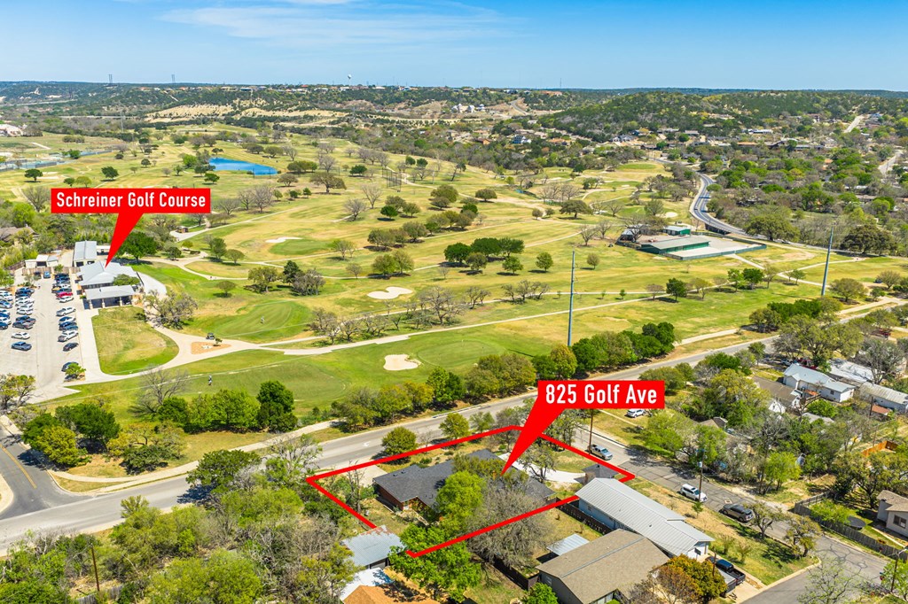 825 Golf Street Kerrville, TX 78028 - Photo 34 of 38 an aerial view of residential houses with outdoor space