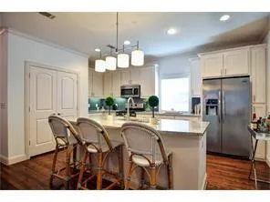 a view of a dining room kitchen and a window