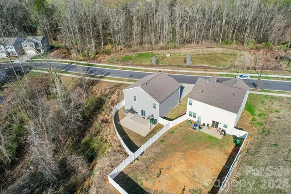 an aerial view of residential house with outdoor space
