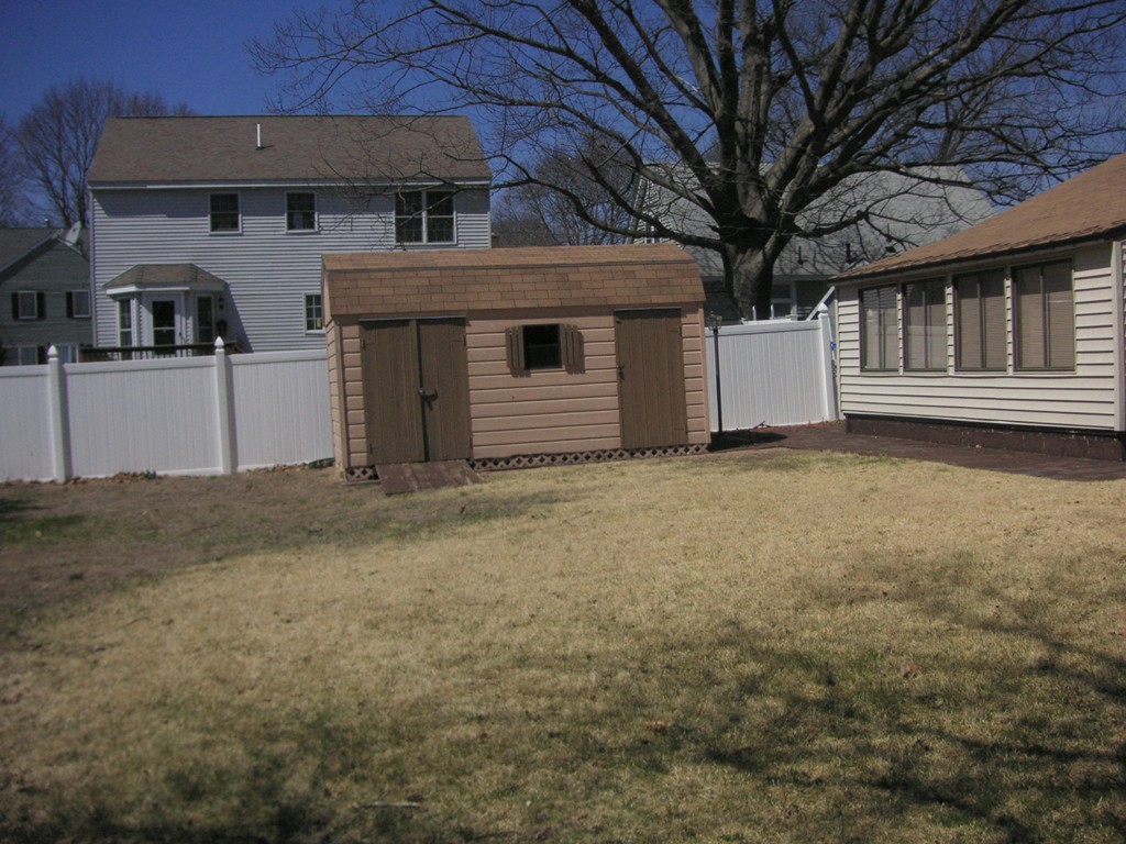 20 Natchez Street Lowell, MA 01850 - Photo 3 of 14 a view of house and front of a house
