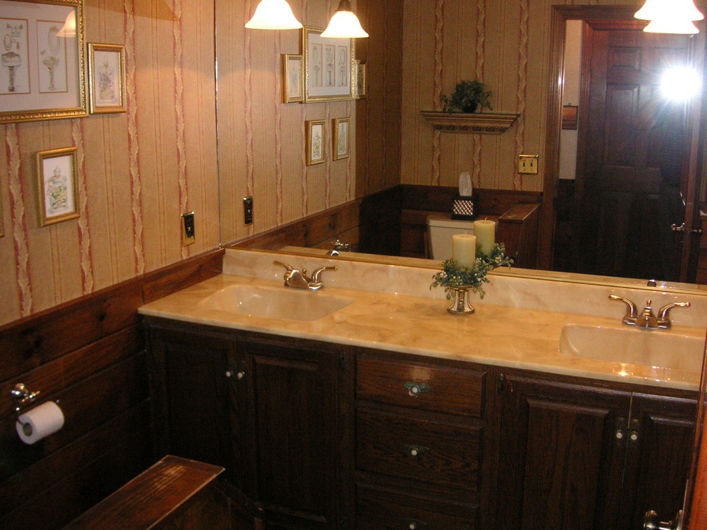 20 Natchez Street Lowell, MA 01850 - Photo 7 of 14 a bathroom with a sink and a mirror