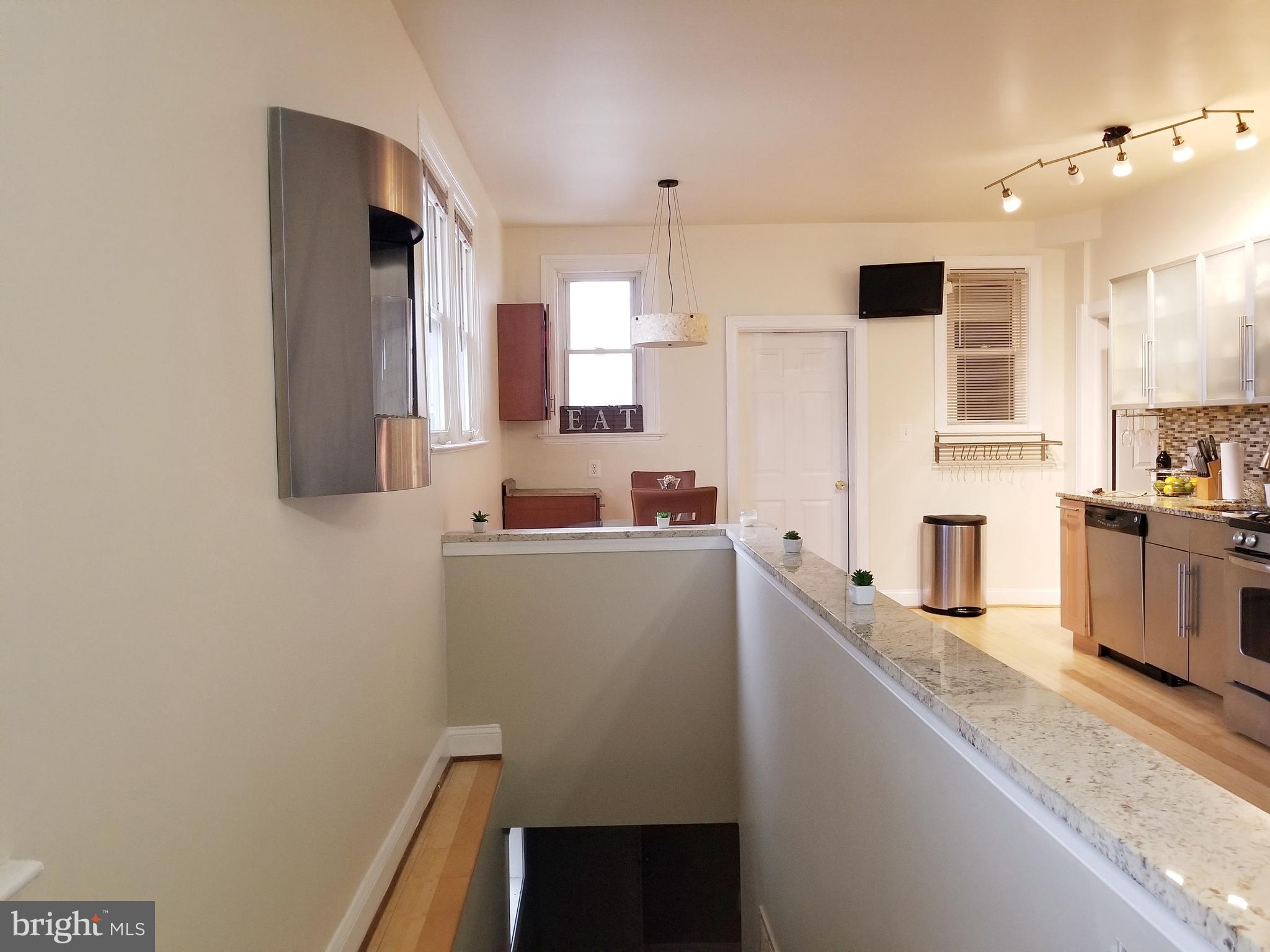 6004 Addison Road Capitol Heights, MD 20743 - Photo 11 of 36 Custom Granite Ledge Leading to Basement