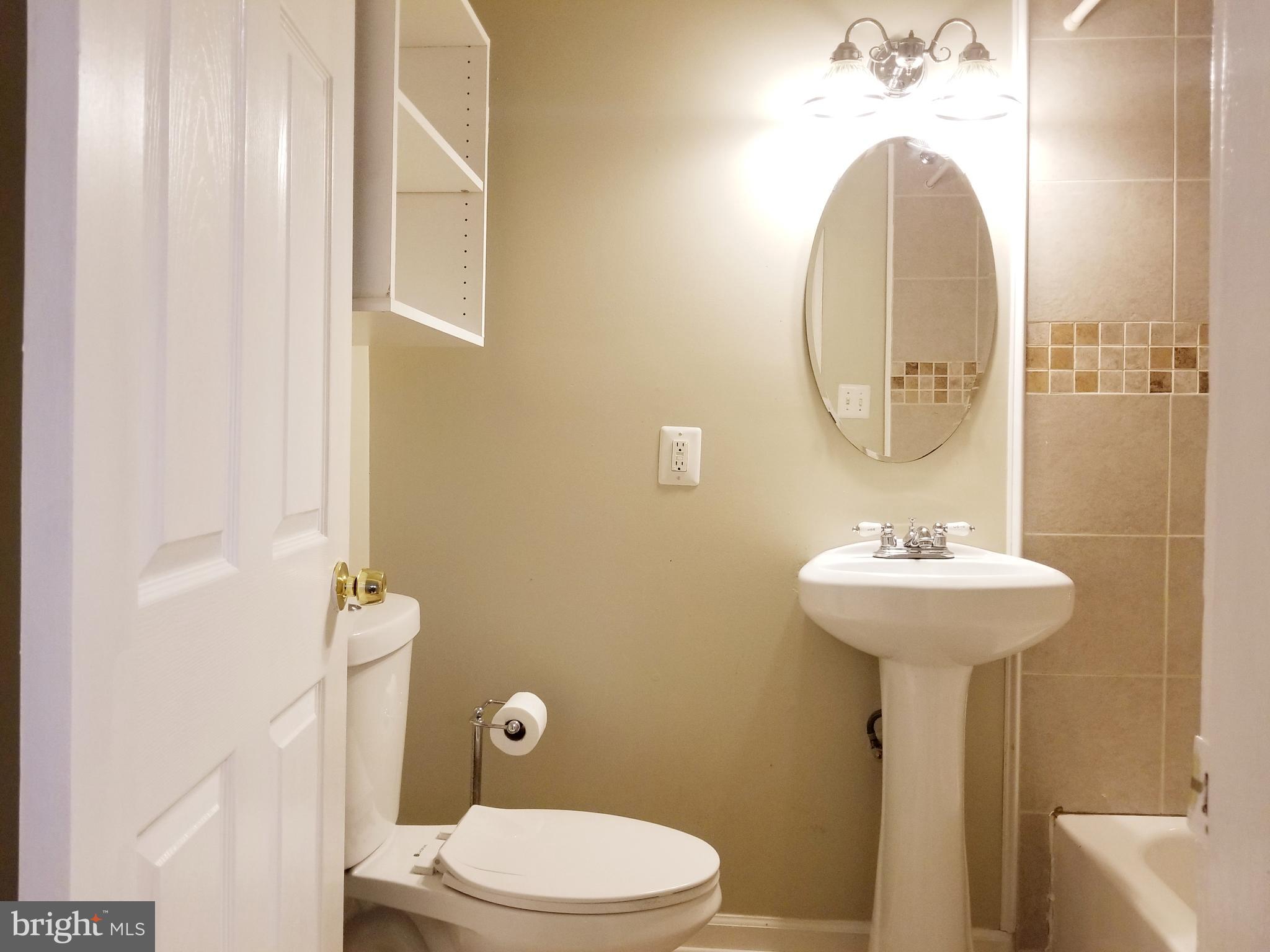 6004 Addison Road Capitol Heights, MD 20743 - Photo 14 of 36 First Floor Full Bathroom