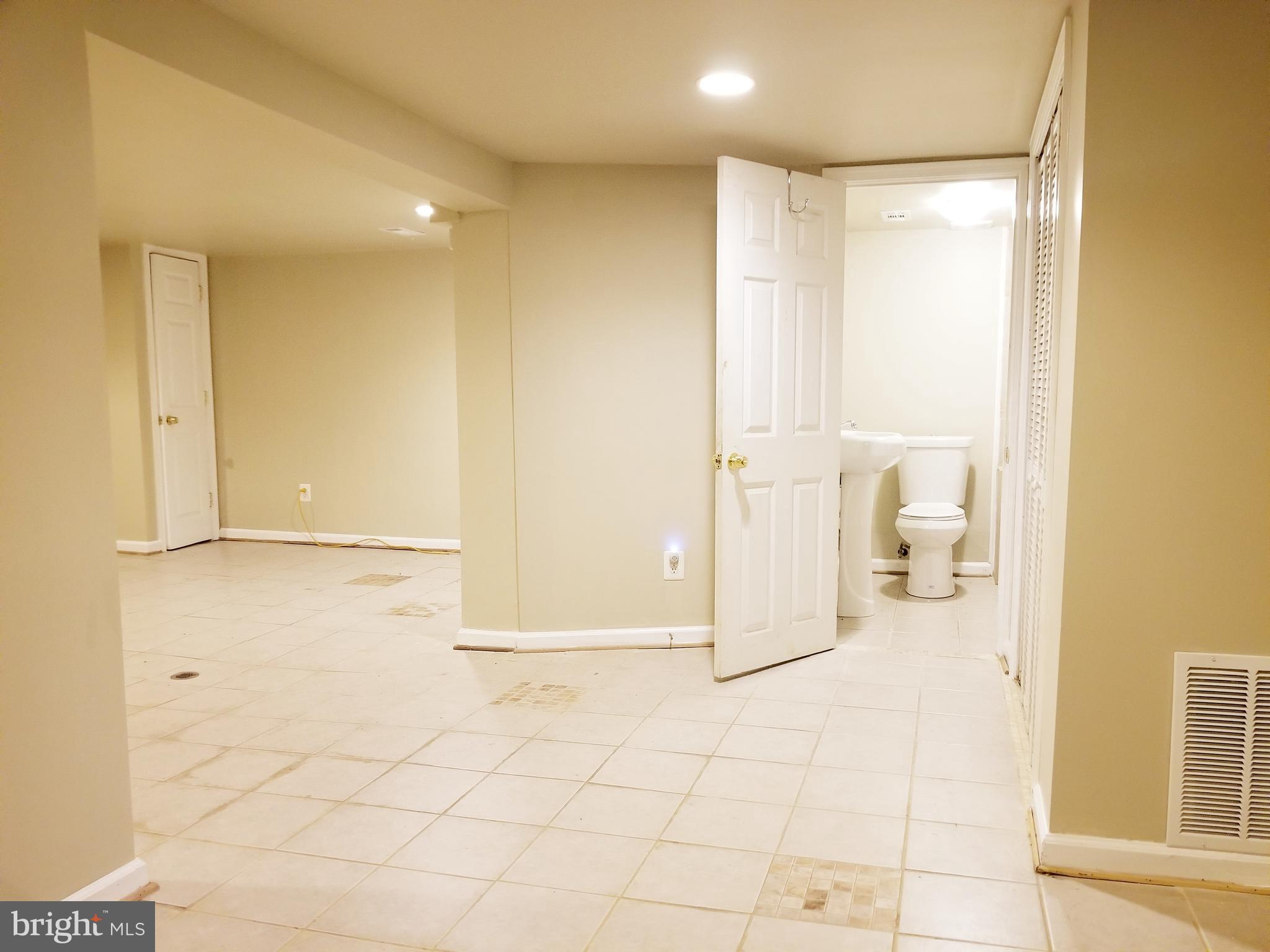 6004 Addison Road Capitol Heights, MD 20743 - Photo 32 of 36 Spacious Basement