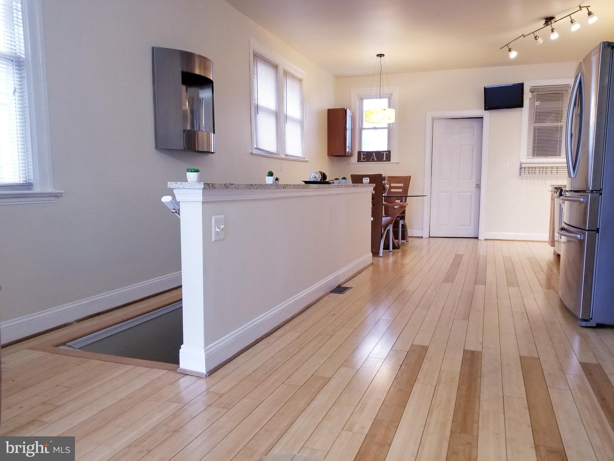 6004 Addison Road Capitol Heights, MD 20743 - Photo 10 of 36 Beautiful Hardwood Floors throughout Main Level