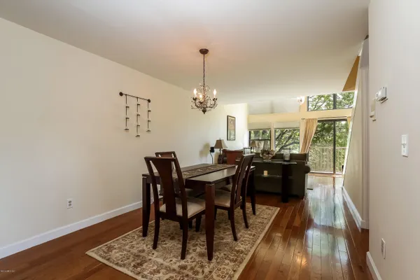 a view of a dining room with furniture