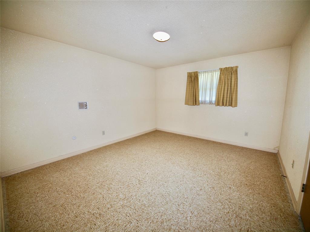 1441 Brazos Street Graham, TX 76450 - Photo 24 of 34 a view of a room with window