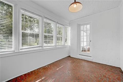 a balcony with wooden floor