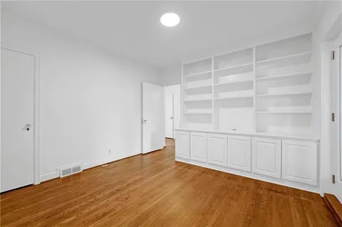 a view of a park with swings