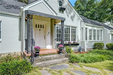 a front view of a house having yard
