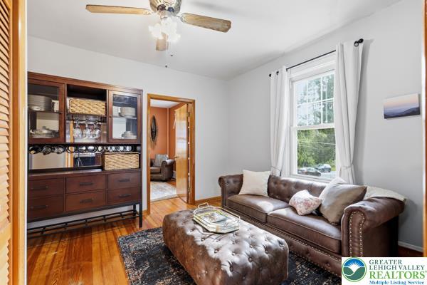 2021 Leithsville Road Hellertown, PA 18055 - Photo 14 of 39 Warm hardwood floors and natural wood accents define this cozy living space.