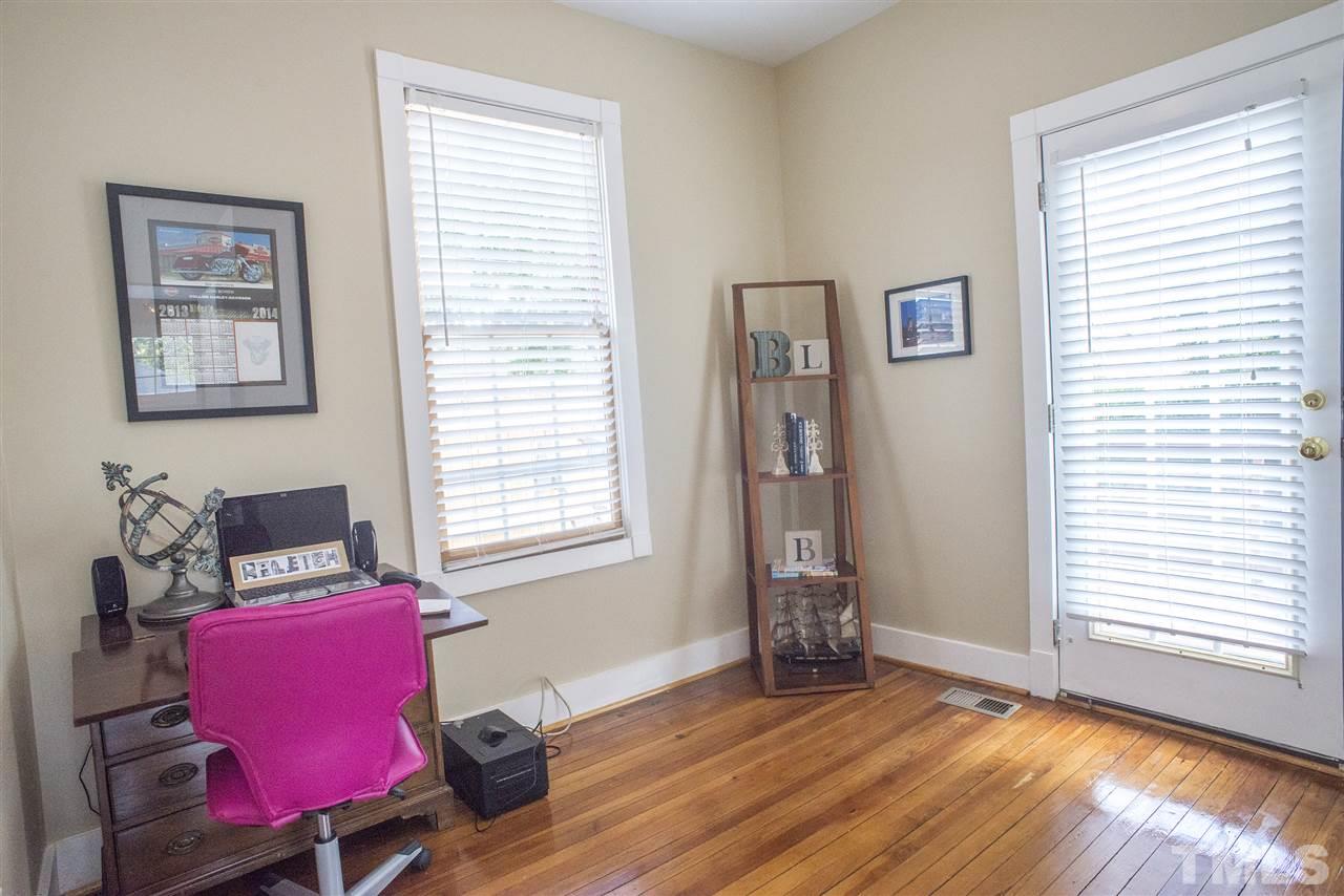 702 East Edenton Street Raleigh, NC 27601 - Photo 16 of 19 a living room with furniture and a window