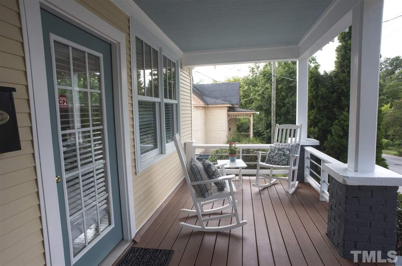 702 East Edenton Street Raleigh, NC 27601 - Photo 3 of 19 a view of balcony with furniture and wooden floor