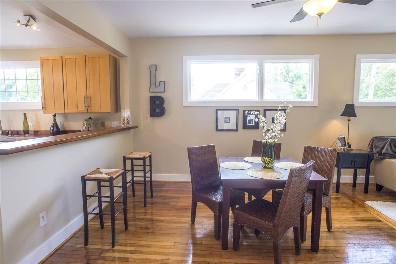 702 East Edenton Street Raleigh, NC 27601 - Photo 6 of 19 a view of a dining room with furniture and window