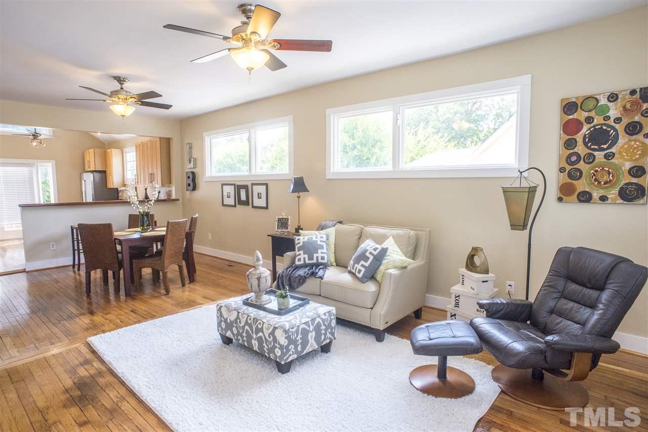 702 East Edenton Street Raleigh, NC 27601 - Photo 10 of 19 a living room with furniture and a large window