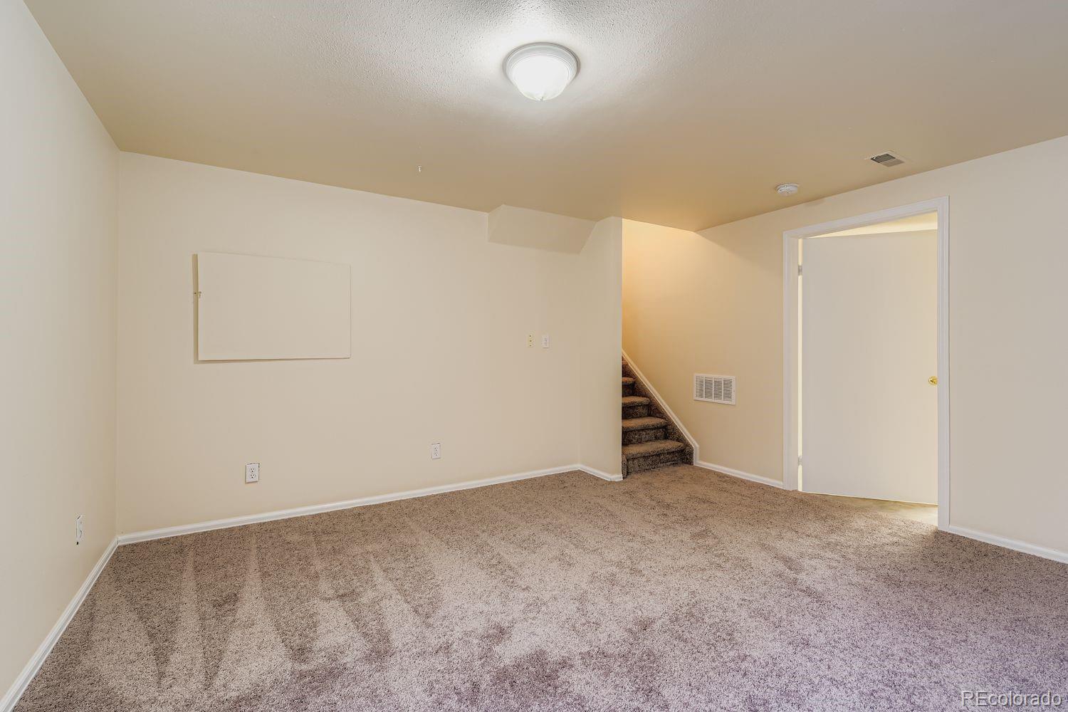 10505 Hyacinth Place Highlands Ranch, CO 80129 - Photo 27 of 40 a view of an empty room