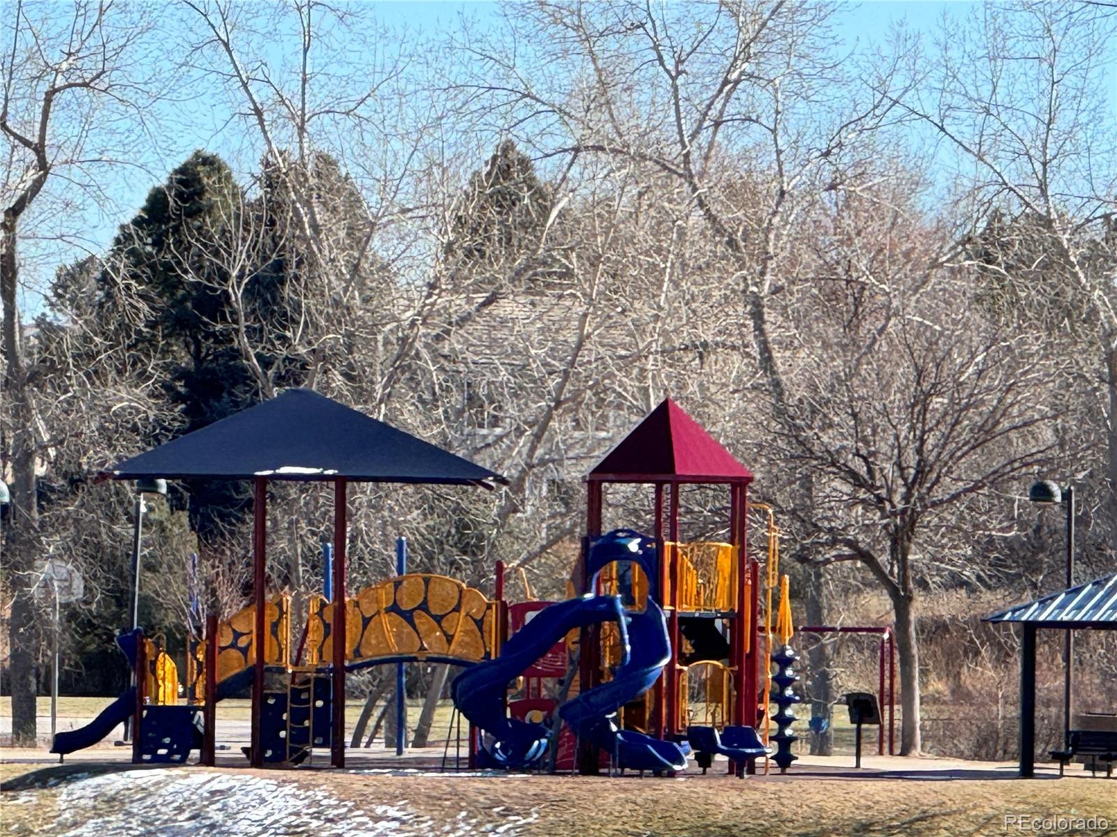 10505 Hyacinth Place Highlands Ranch, CO 80129 - Photo 40 of 40 a group of people sitting outside of a building
