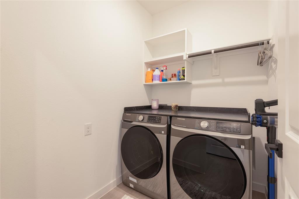 512 Capstone Court Princeton, TX 75407 - Photo 15 of 32 a utility room with dryer and washer