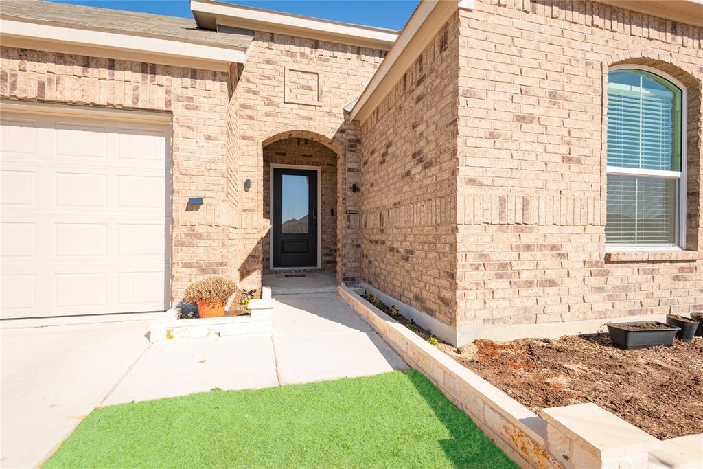 512 Capstone Court Princeton, TX 75407 - Photo 4 of 32 a view of front door of house