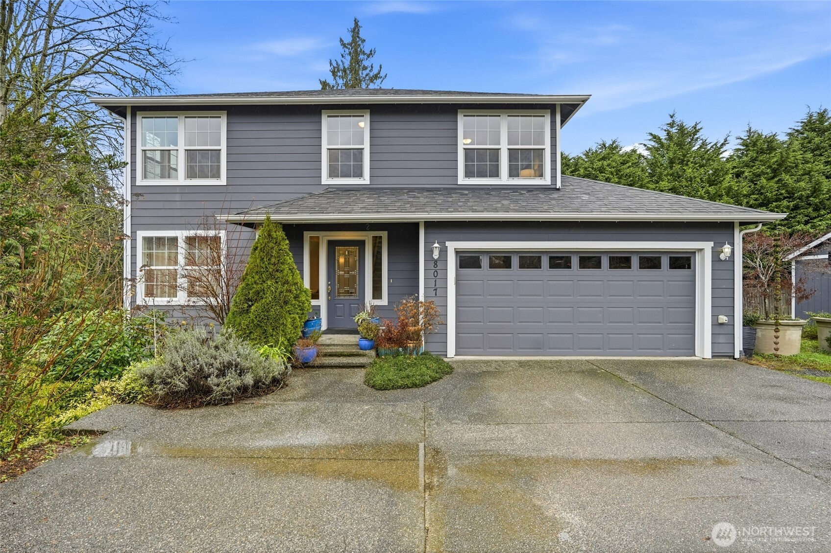 8017 64th Street Southeast Snohomish, WA 98290 - Photo 2 of 39 front view of a house with a yard