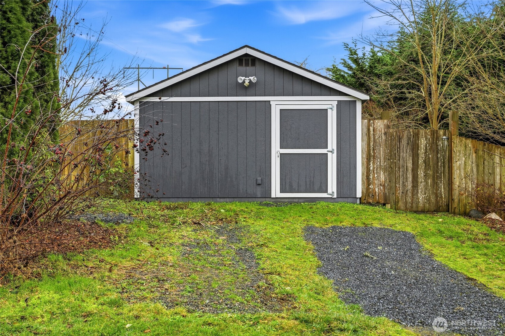 8017 64th Street Southeast Snohomish, WA 98290 - Photo 32 of 39 a front view of a house with garden