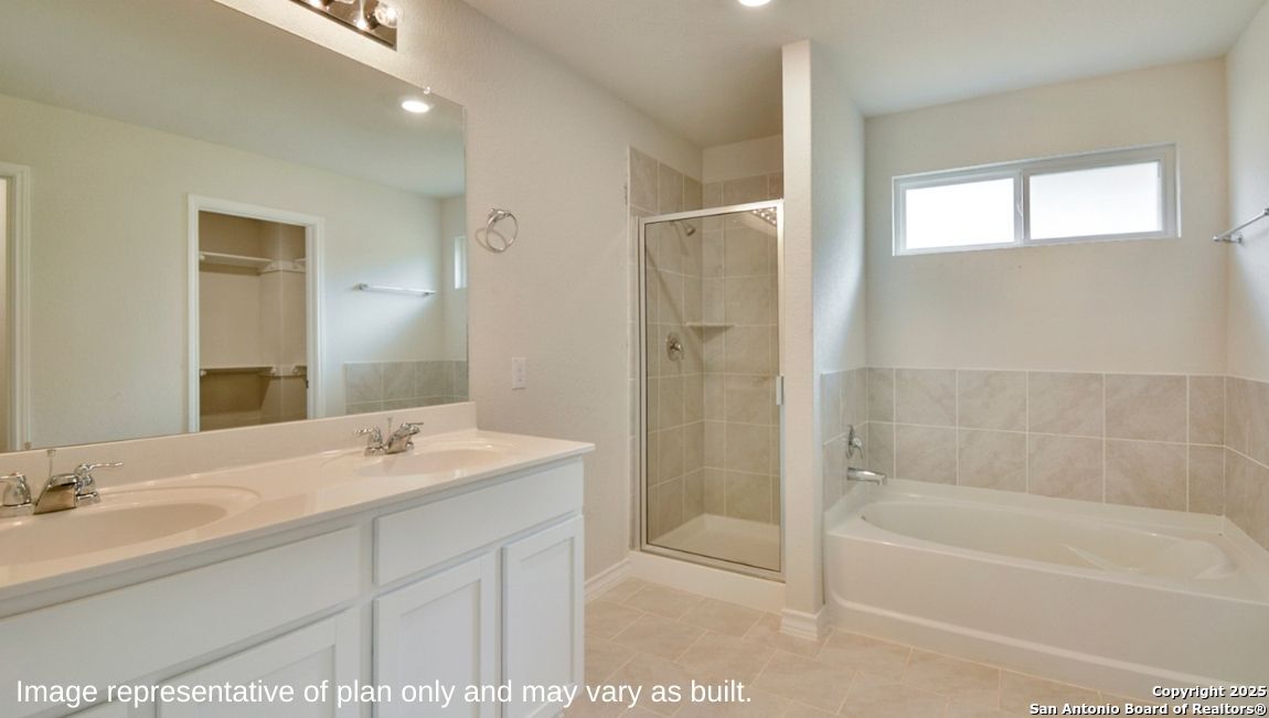 12820 El Arrayan Converse, TX 78109 - Photo 6 of 27 a bathroom with a tub sink shower and a mirror