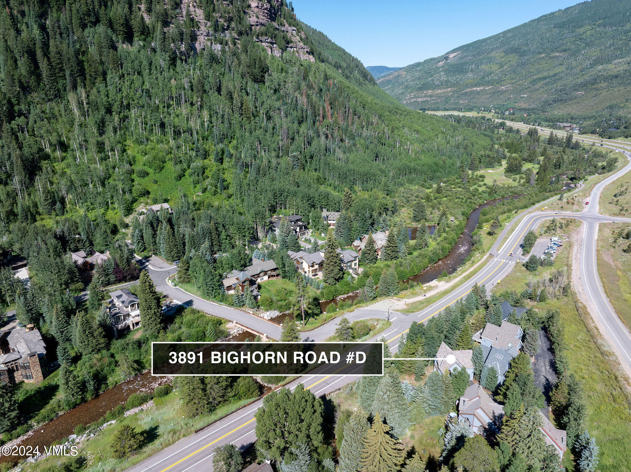 3891 Big Horn Road, Unit D Vail, CO 81657 - Photo 11 of 28 a view of a sign board with mountain view