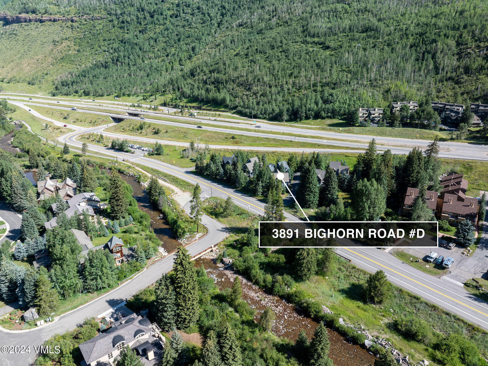 3891 Big Horn Road, Unit D Vail, CO 81657 - Photo 12 of 28 a view of a lush green field