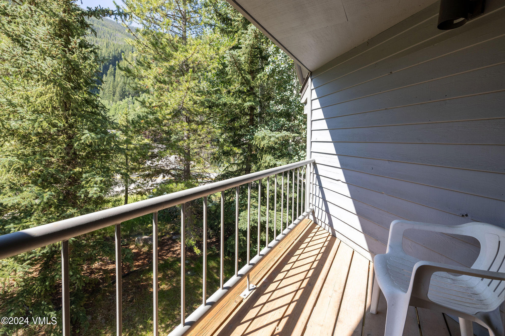 3891 Big Horn Road, Unit D Vail, CO 81657 - Photo 15 of 28 a view of balcony with wooden floor