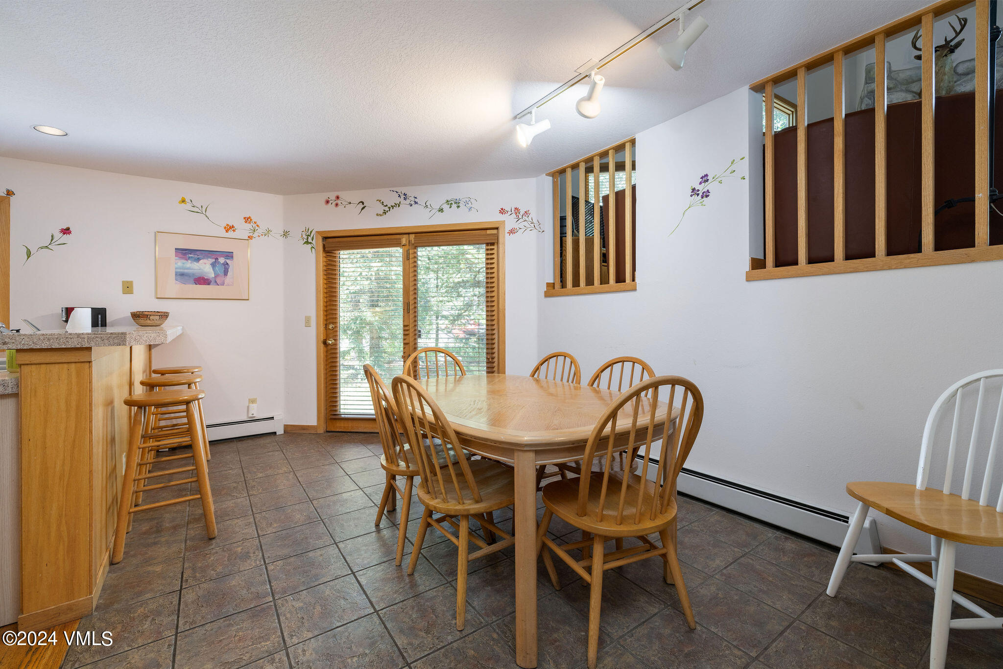 3891 Big Horn Road, Unit D Vail, CO 81657 - Photo 19 of 28 a view of a dining room with furniture