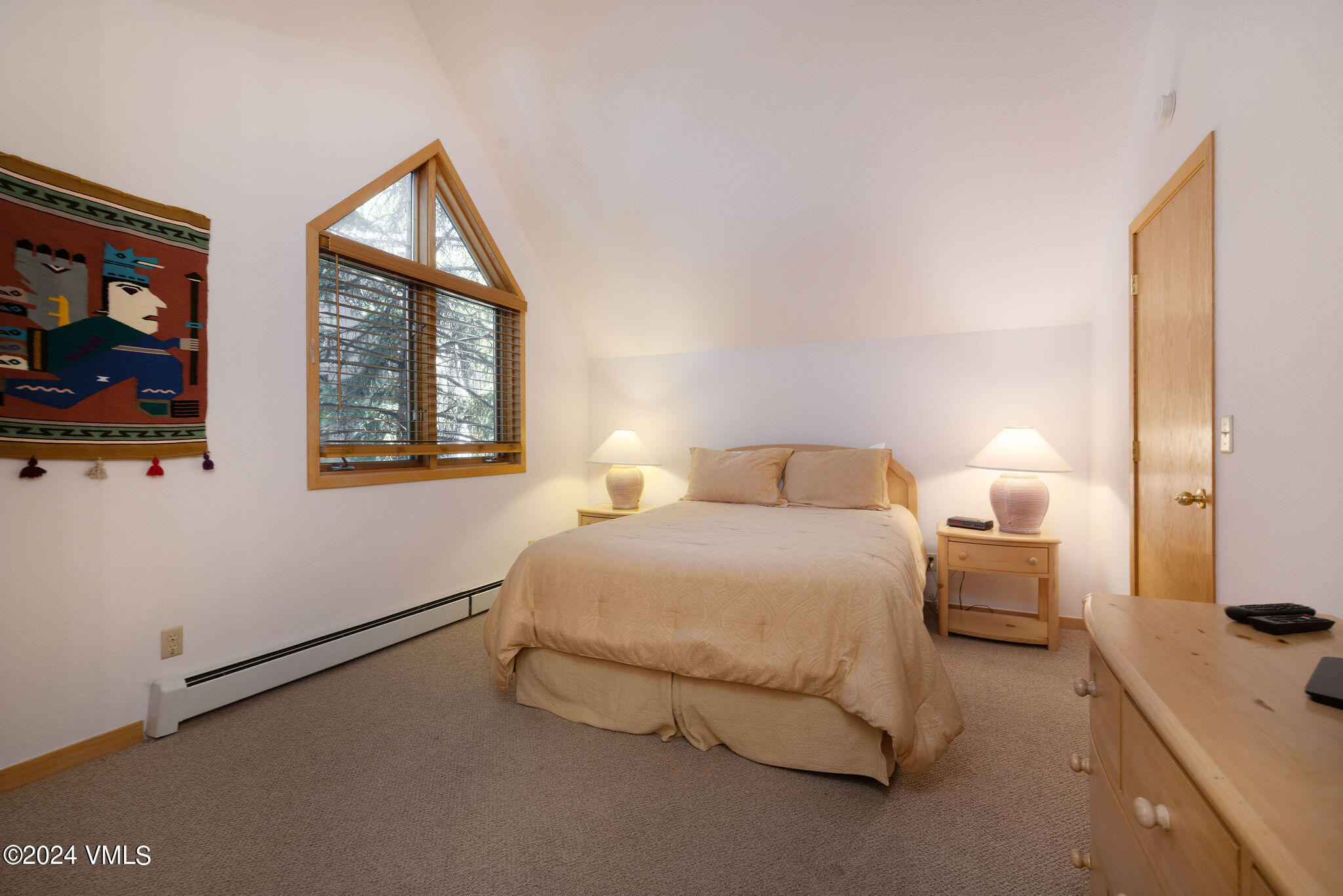 3891 Big Horn Road, Unit D Vail, CO 81657 - Photo 28 of 28 a bedroom with bed and window
