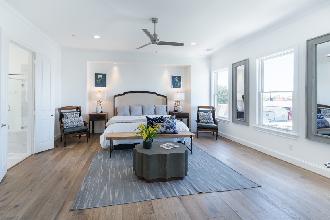 2209 Crocker Street Houston, TX 77006 - Photo 11 of 17 a living room with furniture and a wooden floor