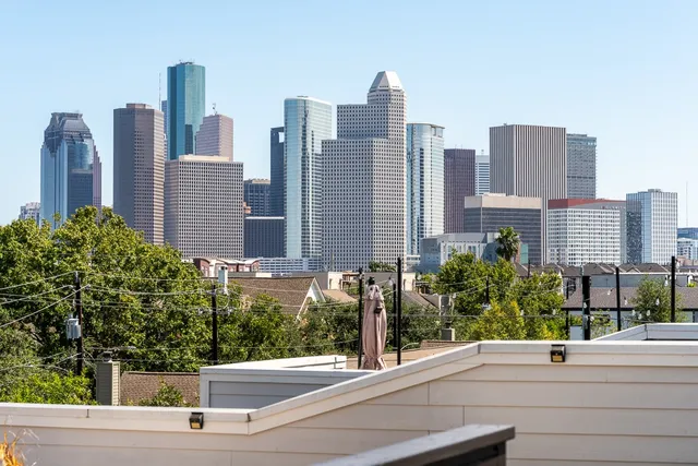 a view of a city with tall buildings